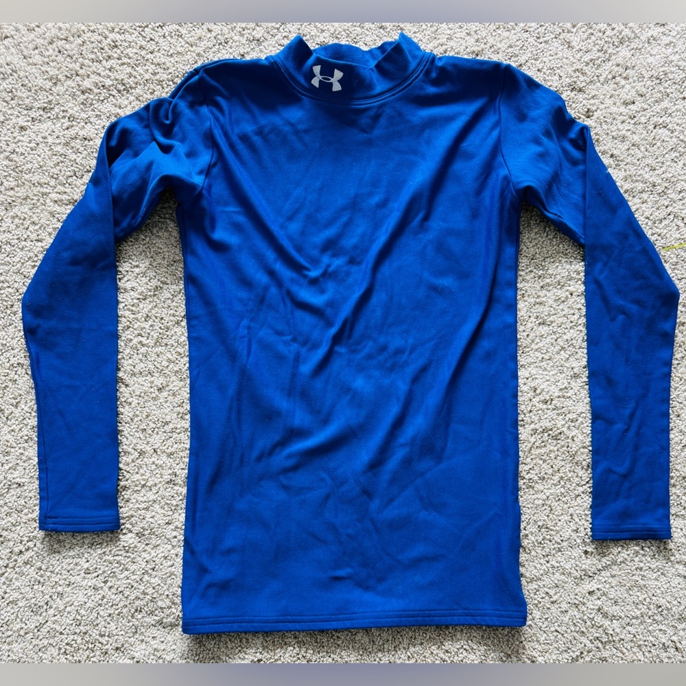 Under Armour size youth XL shirt.  Great for under sports jerseys